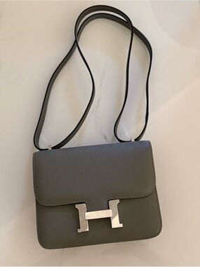 Beautiful croosbiady/shoulder bag in dark gray color.